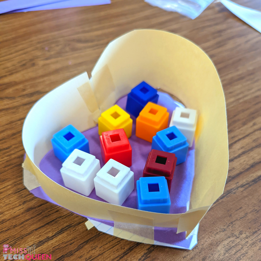 The build a chocolate box STEM challenge helps students practice fine motor skills while completing simple STEM activities for Valentine's Day